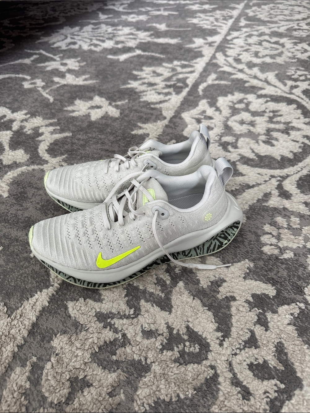 Nike Light Gray Athletic running Sneakers with Neon Yellow Swoosh